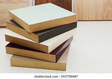 Laminate background. Samples of MDF for flooring and interior design. Production of furniture.