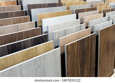 Laminate background. Samples of laminate or parquet with a pattern and wood texture for flooring and interior design. Production of wooden floors