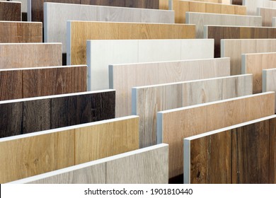 Laminate background. Samples of laminate or parquet with a pattern and wood texture for flooring and interior design. Production of wooden floors
