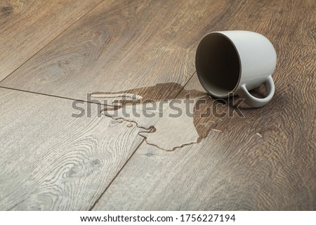 Laminate background.. Wooden laminate and parquet board with spilled water. Moisture protection of a floor [[stock_photo]] © 