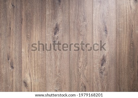 Laminate floor background texture. Wooden table top or wood laminate floor with copy space