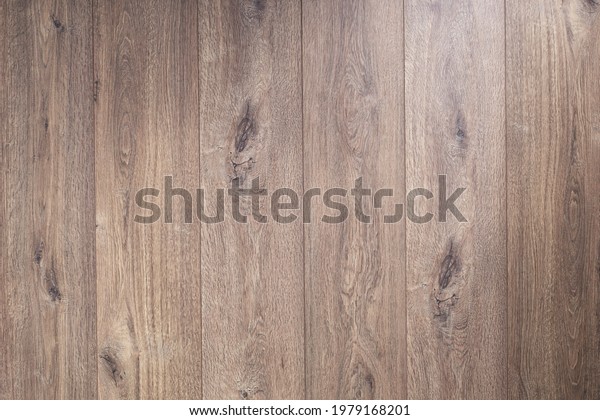 Laminate floor background texture. Wooden\
table top or wood laminate floor with copy\
space