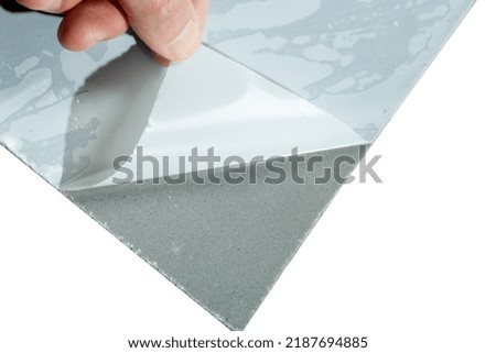 Laminate underlay with adhesive surface. Protective layer for wood flooring.