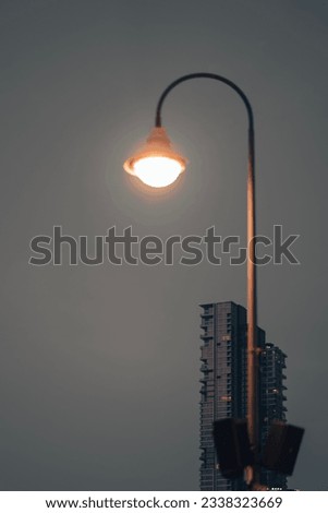 Lamp and building at night
