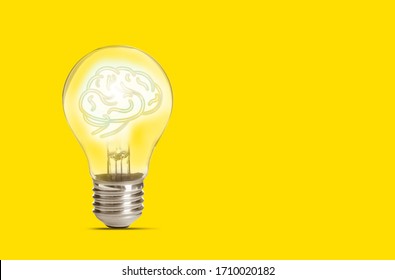 Lamp bulb with human brain inside on yellow background, space for text. Idea generation - Powered by Shutterstock