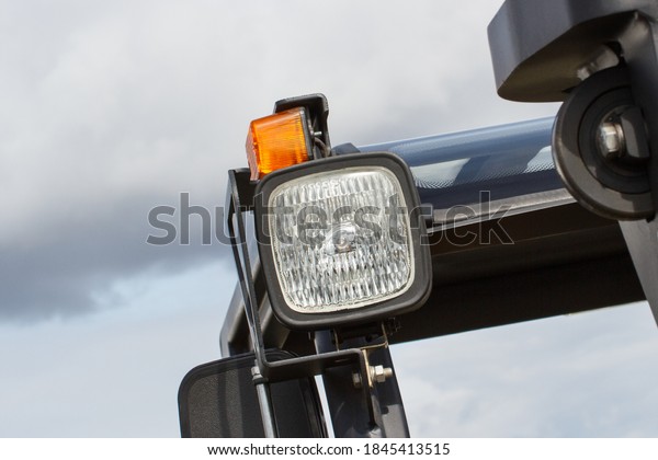 Lamp and direction indicator in truck,\
tractor or other industrial and agricultural machine. Safety while\
driving. Transportation