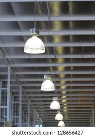 Lamp in hall of warehouse.