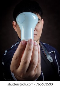 lamp in hand man is creative