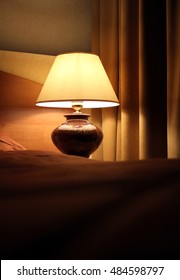 Lamp Night Light In A Dark Background In Hotel Room.