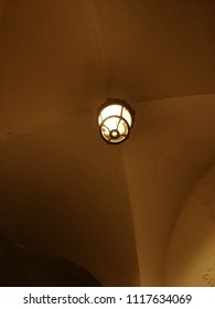 A lamp on the ceiling.