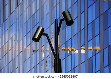 A lamp post in front of a modern building  - Powered by Shutterstock