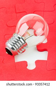 Lamp and red puzzle - concept creativity background