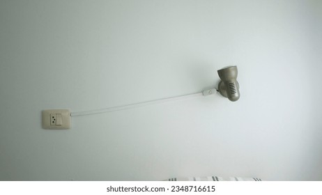Lamp wall and wire to plug