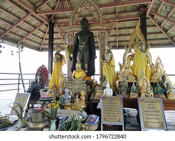 Lampang / Thailand: 25 July 2020: Big Buddha image in standing position at Wat Phra Phutthabat Pu Pha Daeng, Lampang, Thailand