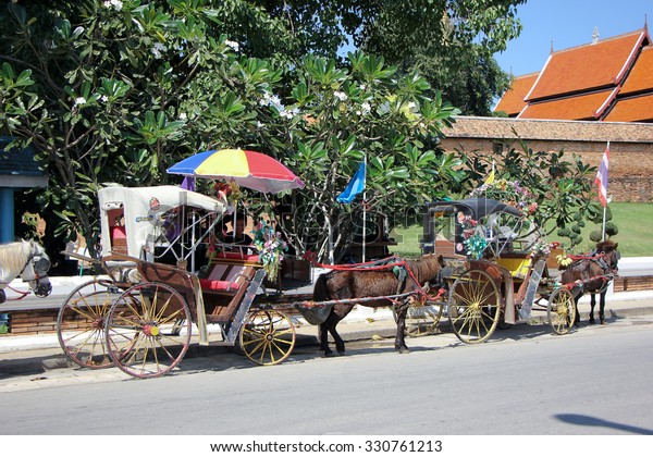 LAMPANG, THAILAND -OCTOBER  21 2015: Horse\
carriage at Wat pra that Lampang Luang. Lanna style Buddhist temple\
in Lampang Province,\
Thailand.