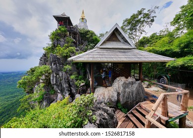 Lampang, Thailand - September 14, 2019 : Wat Chaloem Phra Kiat Phrachomklao Rachanusorn or Wat Phrabat Pu Phadaeng located on Doi Pu Yak unseen place in Chae Hom District                            