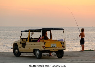 LAMPEDUSA, SICILY, ITALY, CIRCA AUGUST, A Family On A Citroen Mehari, A Typical Beach Car In The Island Of Lampedusa On 2022.