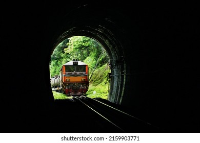 Lamphun, Thailand - August 21, 2020: Freight Train By Alstom Locomotive Is Entering The Khun Tan Railway Tunnel