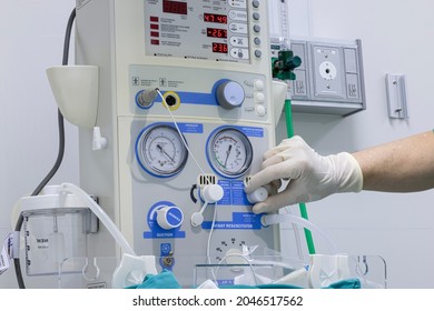 Lamphun, Thailand - July 14th, 2021:  A Doctor Adjusting An Oxygen Pressure On An Infant Resuscitator.