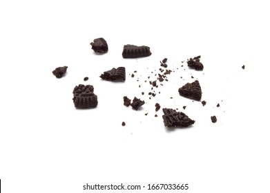 LAMPHUN, THAILAND - MARCH 3, 2020: Oreo Biscuits with crumbs  isolated on white background. It is a sandwich cookies filled with chocolate cream flavored. The best selling dessert in Thailand.