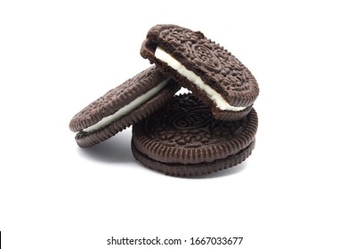 LAMPHUN, THAILAND - MARCH 3, 2020: Oreo Biscuits Isolated On White Background. It Is A Sandwich Chocolate Cookies With A Sweet Cream Is The Best Selling Dessert In Thailand. 