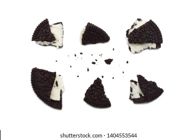 LAMPHUN, THAILAND - MAY 22, 2019: Oreo Biscuits with crumbs isolated on white background. It is a sandwich chocolate cookies with a sweet cream is the best selling dessert in Thailand. 