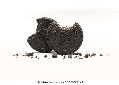 LAMPHUN, THAILAND - NOVEMBER 21, 2019: Oreo Biscuits isolated on white background. Sandwich chocolate cookies with a sweet cream is the best selling dessert in Thailand.