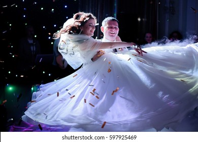 Lamps Shine Like Stars Over Wedding Couple Whirling On The Dancefloor