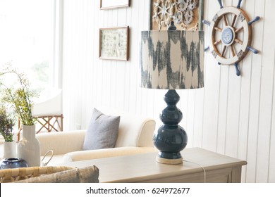 Lampshade On Table In Seaside Home Interior