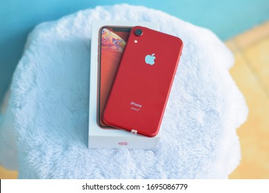 Lampung, Indonesia - March 20 2020 :  Iphone Xr With Bright Red Color