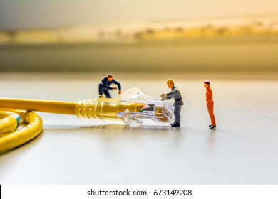  LAN cable and toy engineer. - Powered by Shutterstock