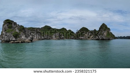 Lan Ha Bay - next to Ha Long Bay - picturesque karstic limestone rock formation in the ocean - Vietnam