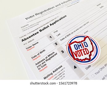 Lancaster, Ohio / USA: Absentee ballot application for American elections with Ohio voted sticker. Ohio has been one of the swing states in the past Presidential elections.early voting form. 2020. 