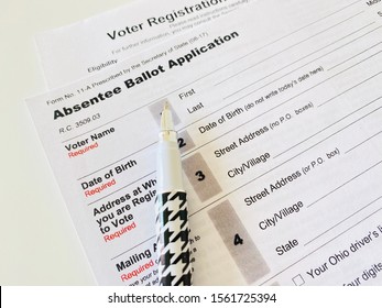 Lancaster, Ohio / USA: November 2019 American absentee ballot application form for people to vote for elections via mail with a pen. Ohio form. Early voting form. 2020. Swing States.

