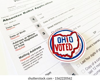 Lancaster, Ohio / USA - November 2019: Ohio voted sticker on an absentee ballot application form. Presidential election swing state State of Ohio mail-in voting Early voting 2020