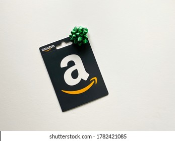 Lancaster Ohio/USA- July 2020: Amazon Store Gift Card With A Green Bow.