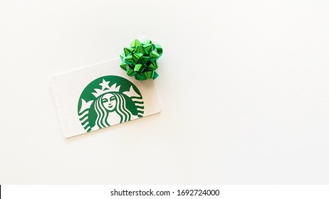 Lancaster Ohio/USA-April 2020: A Starbucks Gift Card With A Green Bow