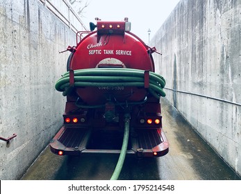 Lancaster, Ohio/USA-February 2020: A Septic Tank Truck Backed Up To A Building To Drain An Indoor Septic Tank.