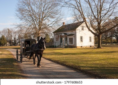 Lancaster, PA / USA - January 28 2012: Amish Horse And Buggy In Rural Lancaster County, PA In A Winter 
Sunny Day