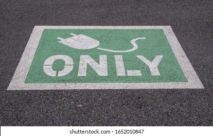 Lancaster, Pennsylvania, USA, February 19, 2020: Electric Car Charging Station Outside Local Grocery Store.