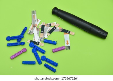 Lancet pen ,Diabetes Glucose Test Strip.Blood Glucose Test Strips - Powered by Shutterstock