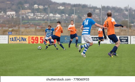 Lancing, England; 17th December 2017; Action Shots, Sunday League Amatur Football Match Between Hillside Rangers FC And BC Rovers FC. Player Attempts Tackle