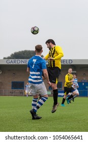 Lancing, England; 25th March 2018; Action Shots, Sunday League Amatur Football Match Between Hillside Rangers FC And AFC Beavers FC. Player Jumps To Head Ball