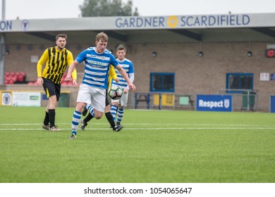 Lancing, England; 25th March 2018; Action Shots, Sunday League Amatur Football Match Between Hillside Rangers FC And AFC Beavers FC. Player Dribbles With Ball