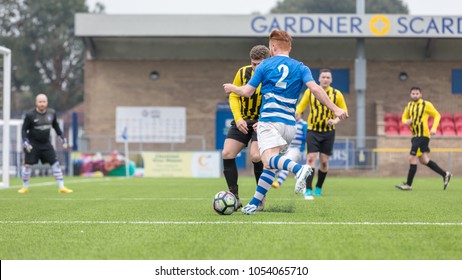 Lancing, England; 25th March 2018; Action Shots, Sunday League Amatur Football Match Between Hillside Rangers FC And AFC Beavers FC. Player Dribbles Towards Goal