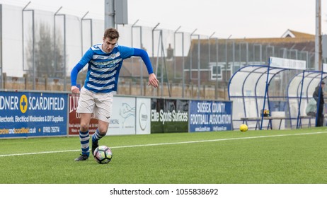 Lancing, England; 25th March 2018; Action Shots, Sunday League Amatur Football Match Between Hillside Rangers FC And AFC Beavers FC. Player Crosses Ball