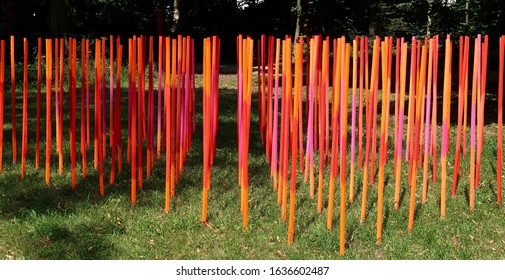 Land Art Project Stadtpark Erding Wooden Sticks In Red Orange And Pink