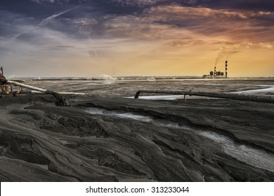 A Land Of Ash. Hundreds Of Square Miles Covered With Lifeless Ash. Ash Waste Is Produced By Burned Coal In A Power Plant. 