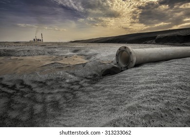 A Land Of Ash. Hundreds Of Square Miles Covered With Lifeless Ash. Ash Waste Is Produced By Burned Coal In A Power Plant. 