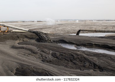 Land Of Ash. Ash Waste Produced By Burned Coal In A Power Plant.